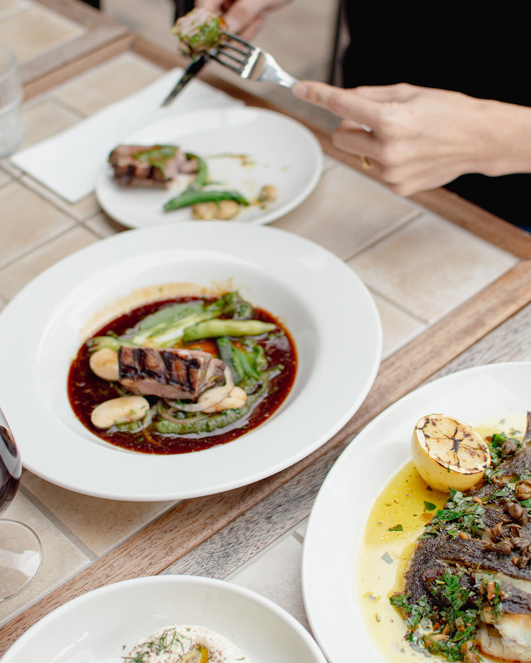 A table of dishes from Bistro Allpress