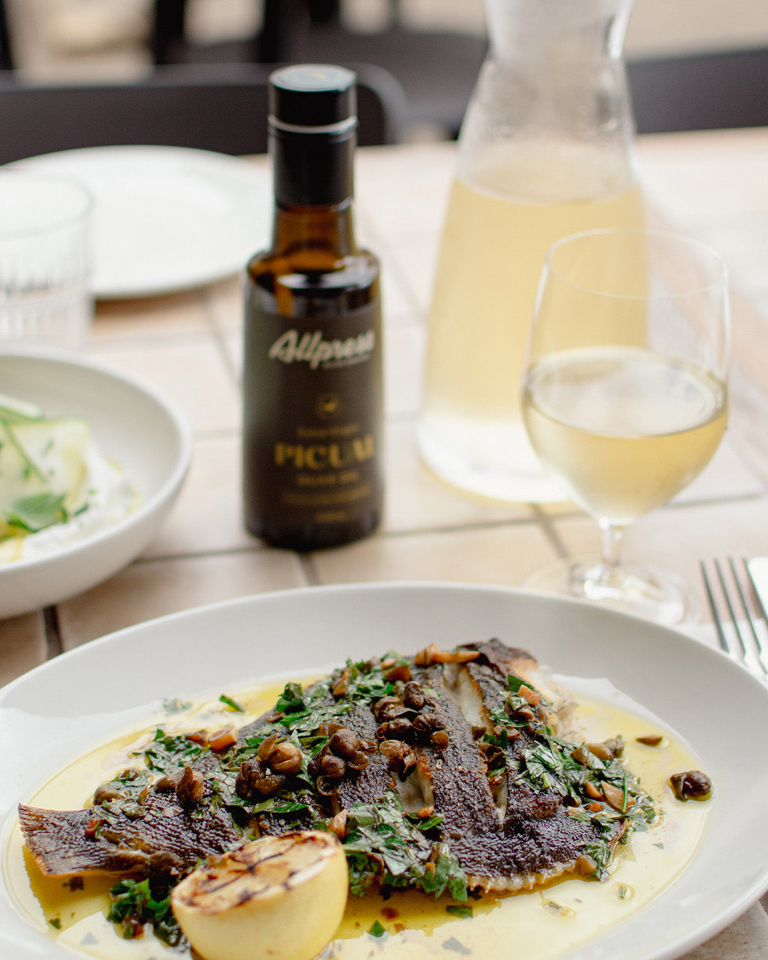 Food from Bistro Allpress on Waiheke Island with a bottle of Picual Olive oil in the back