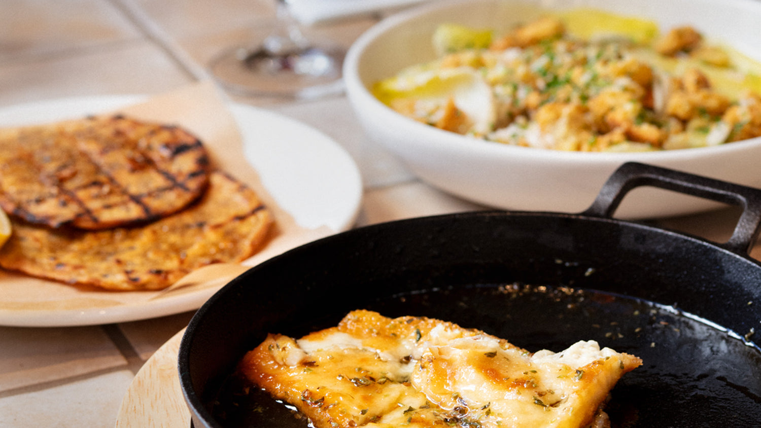 Seasonal dishes shared around the table at Bistro Allpress on Waiheke Island